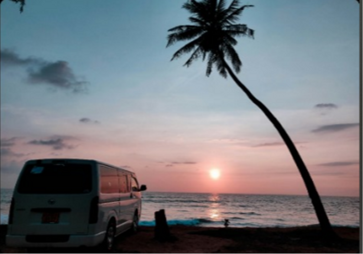 Van at beach sunset